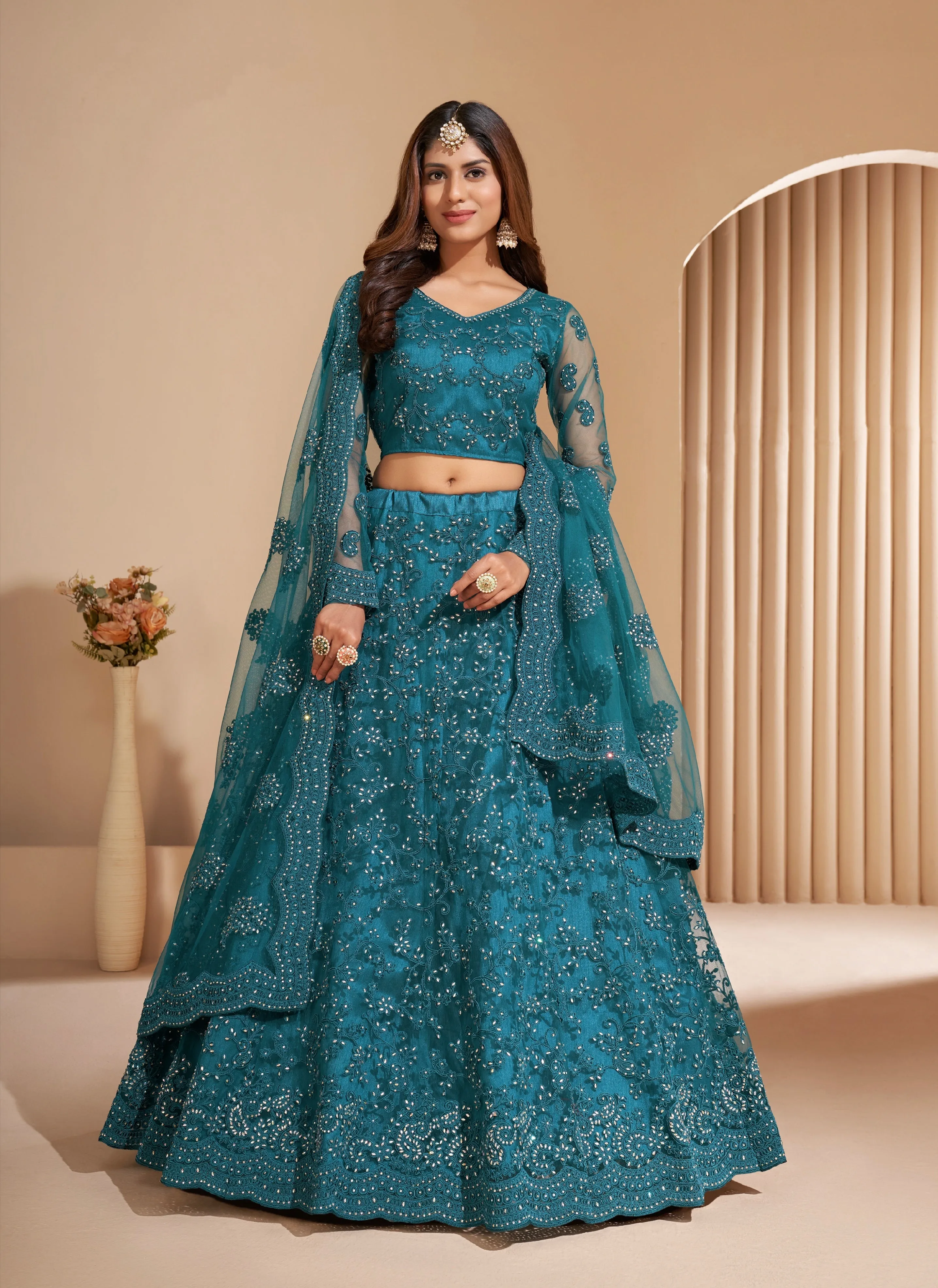 Elegant Teal Net Lehenga with Silk Inner and Thread & Cording Embroidery