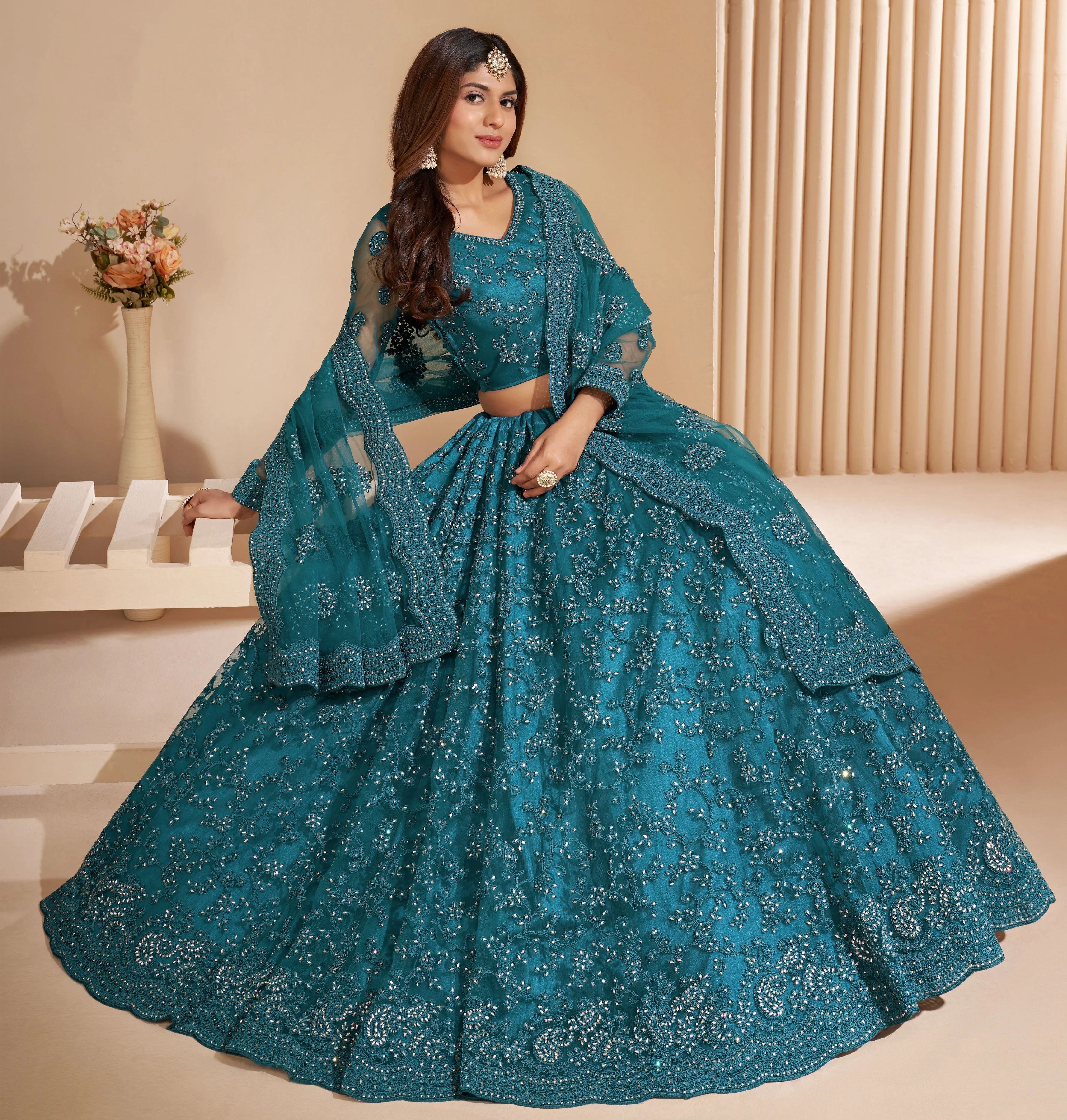 Elegant Teal Net Lehenga with Silk Inner and Thread & Cording Embroidery