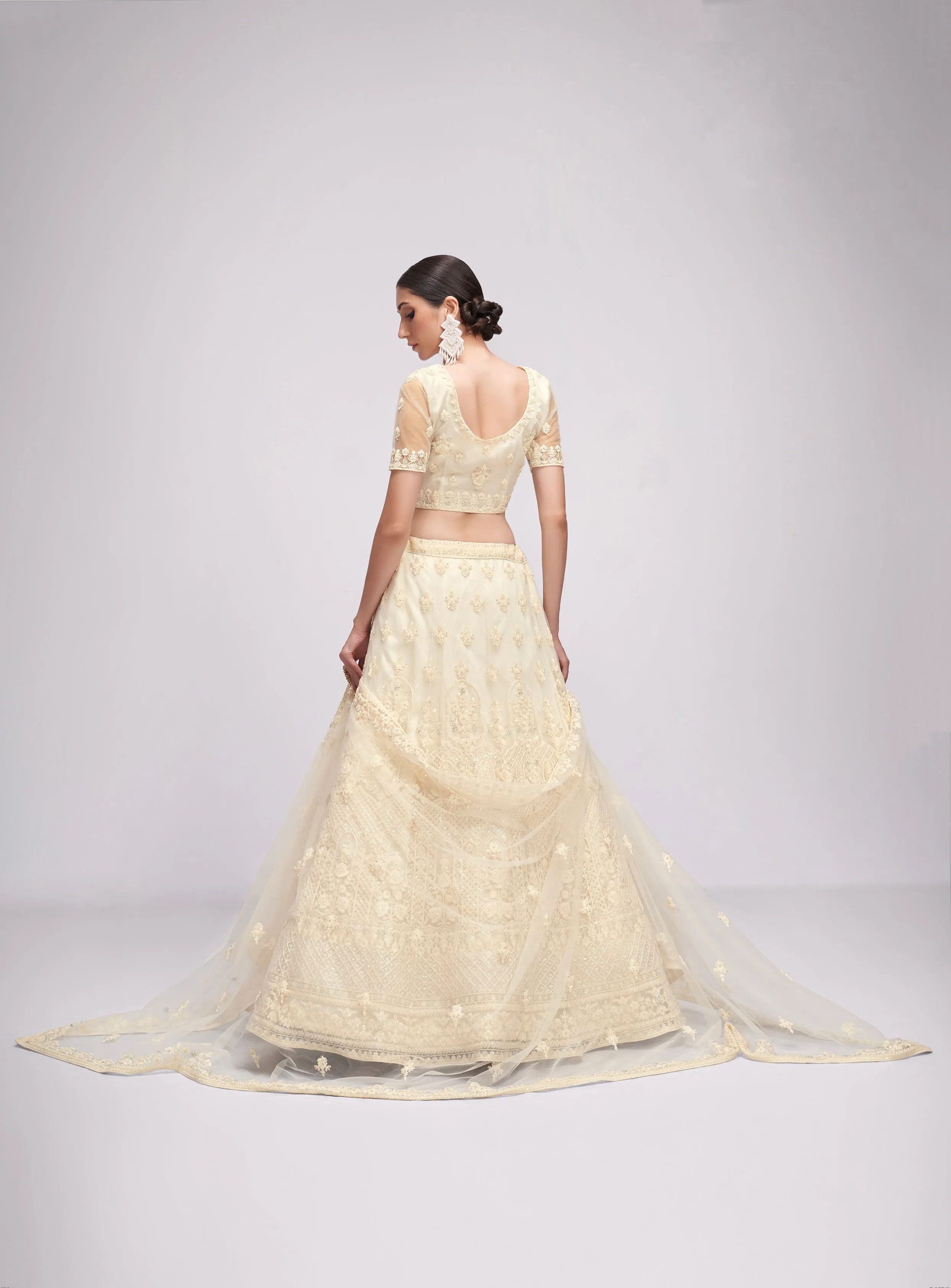 Graceful Off-White Net Lehenga with Cording, Thread & Sequins Embroidery and Stone Embellishments
