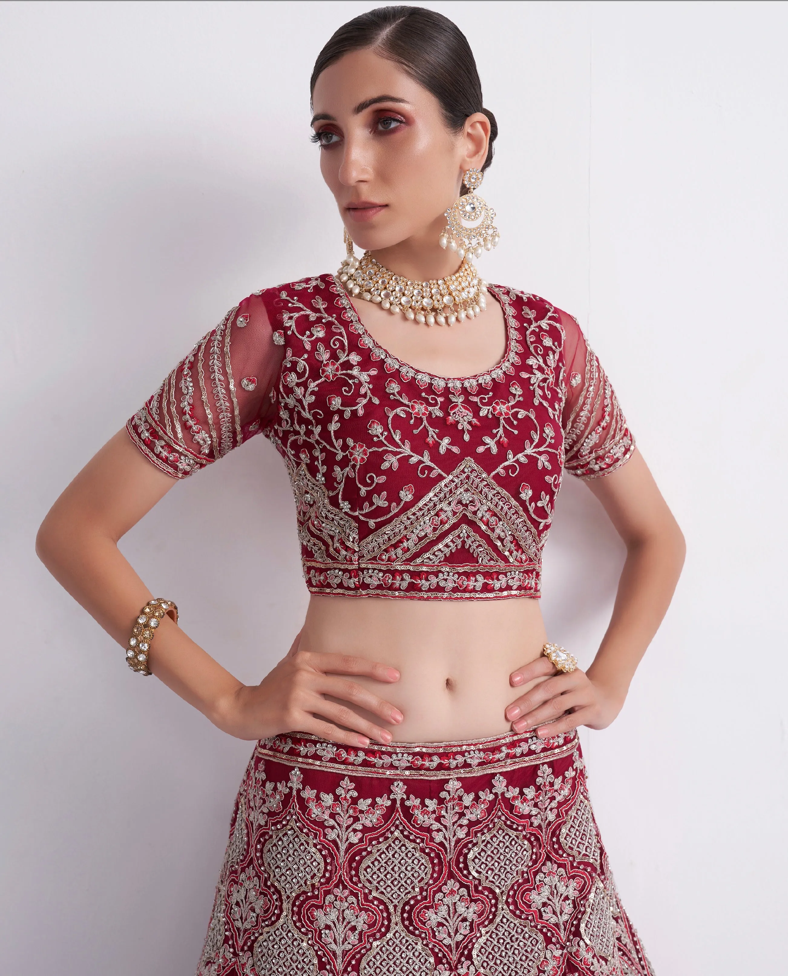 Maroon Net Lehenga Choli with Heavy Stone Work Embellishment