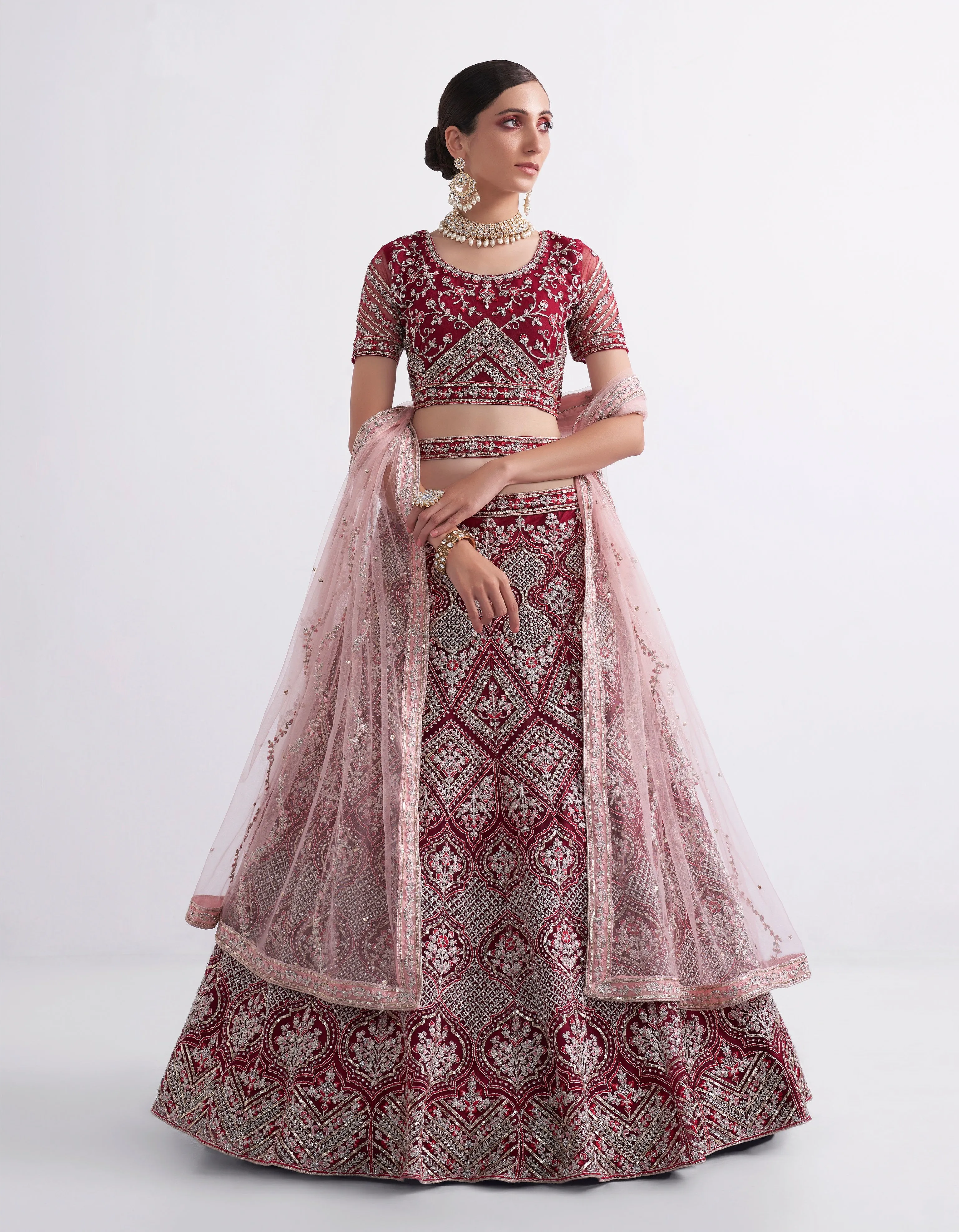 Maroon Net Lehenga Choli with Heavy Stone Work Embellishment